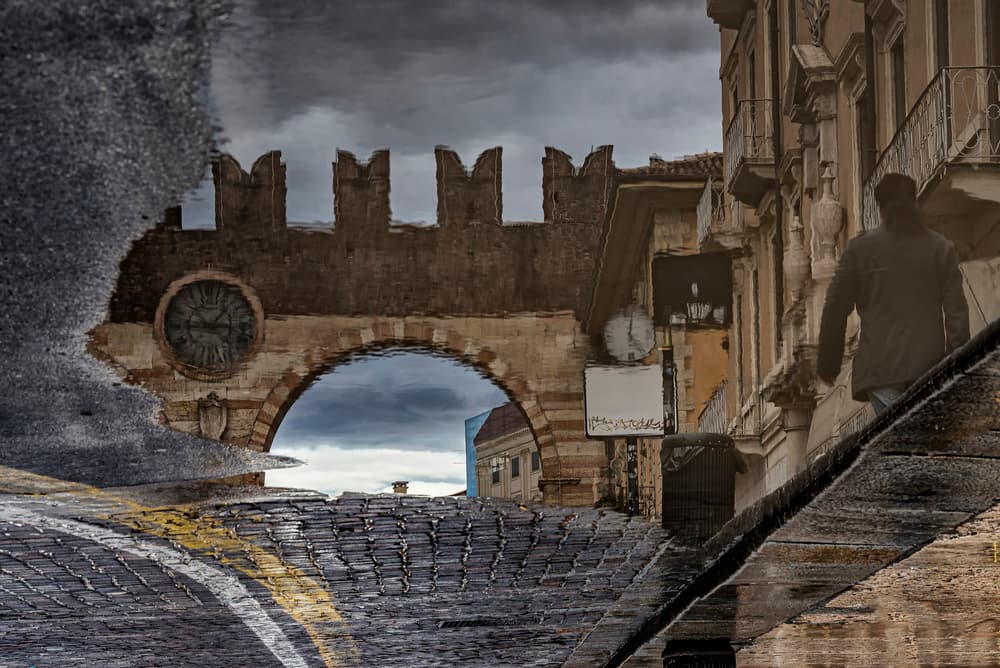 Rainy City Archway by Ömer Ates Kızıltug — canvas wall art