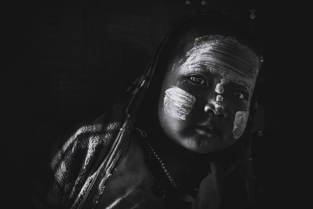 Painted Face Child by Marco Tagliarino — canvas wall art