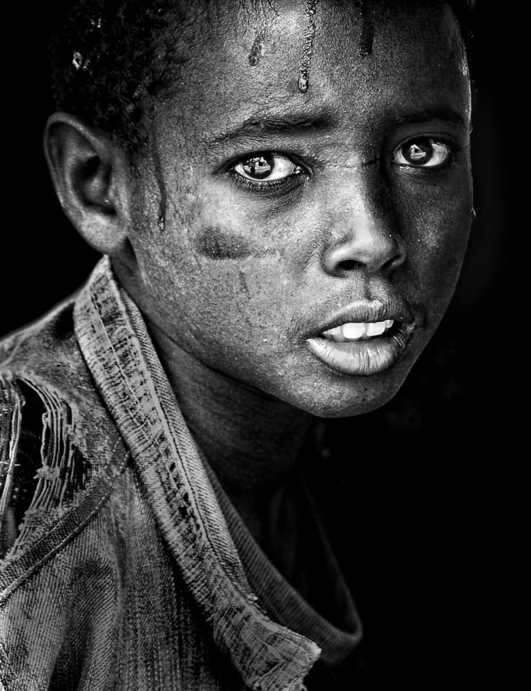 Intense Boy Portrait by Husain Alfraid — canvas wall art