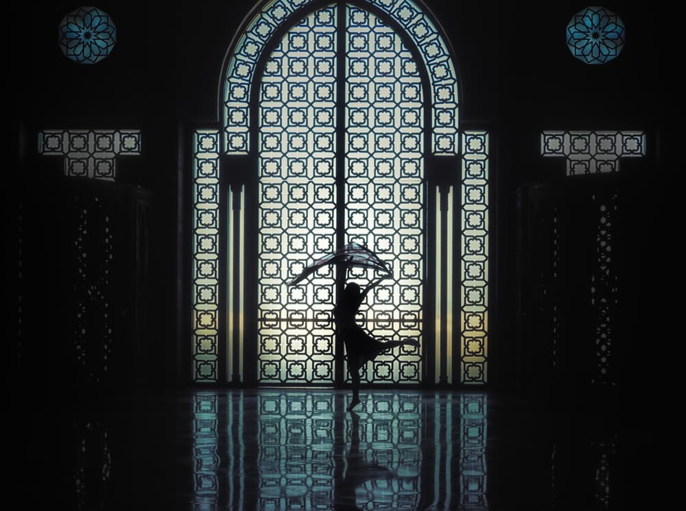 Umbrella Dancer Reflection by Rainer Inderst — canvas wall art