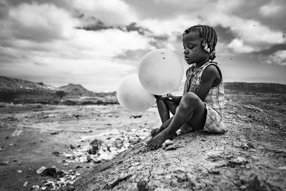 Pensive Child Balloons by João Coelho — canvas wall art
