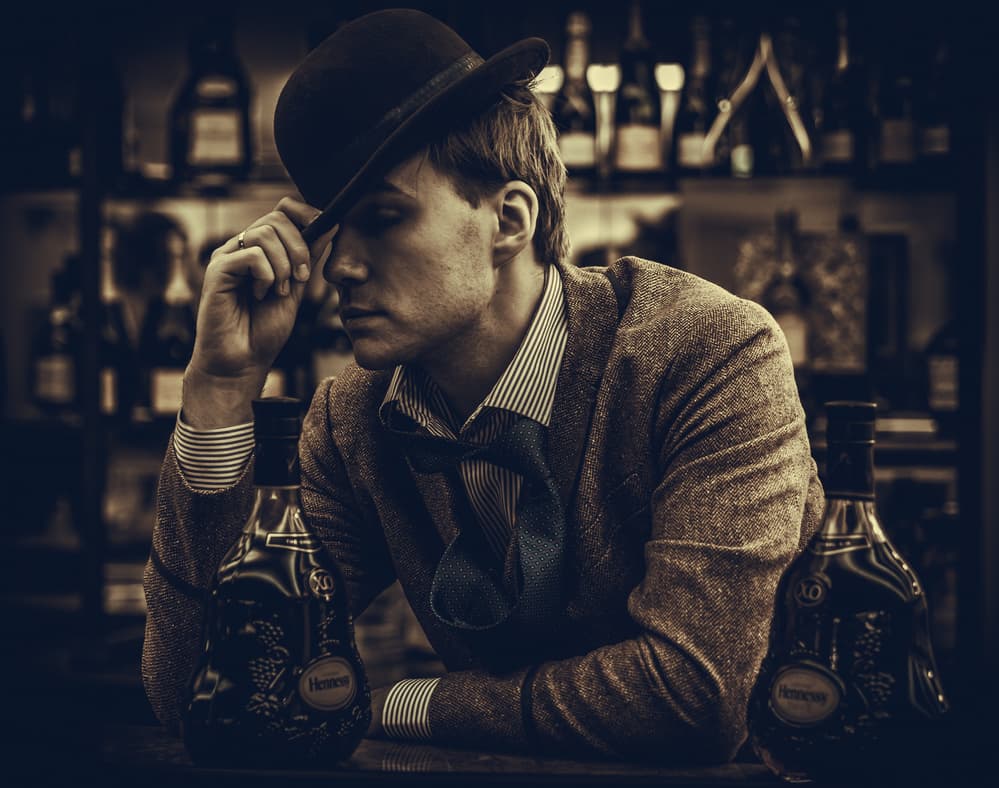 Pensive Man at Bar by Oles Paritskiy — canvas wall art