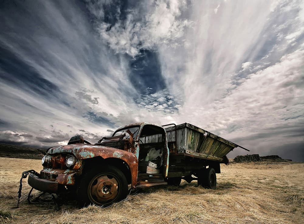Rusty Truck Under Sky by Þorsteinn H. Ingibergsson — canvas wall art