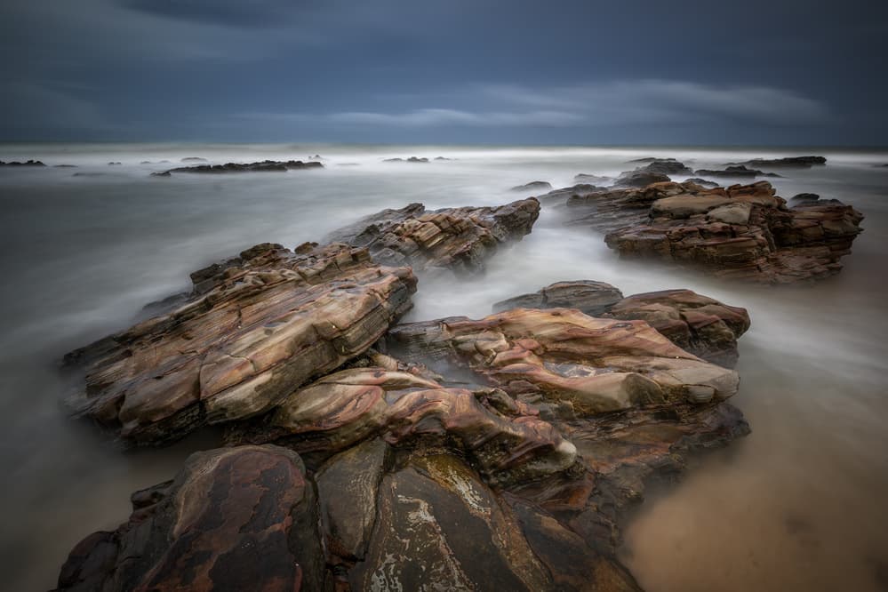 Moody Coastal Rocks by Gunarto Song — canvas wall art