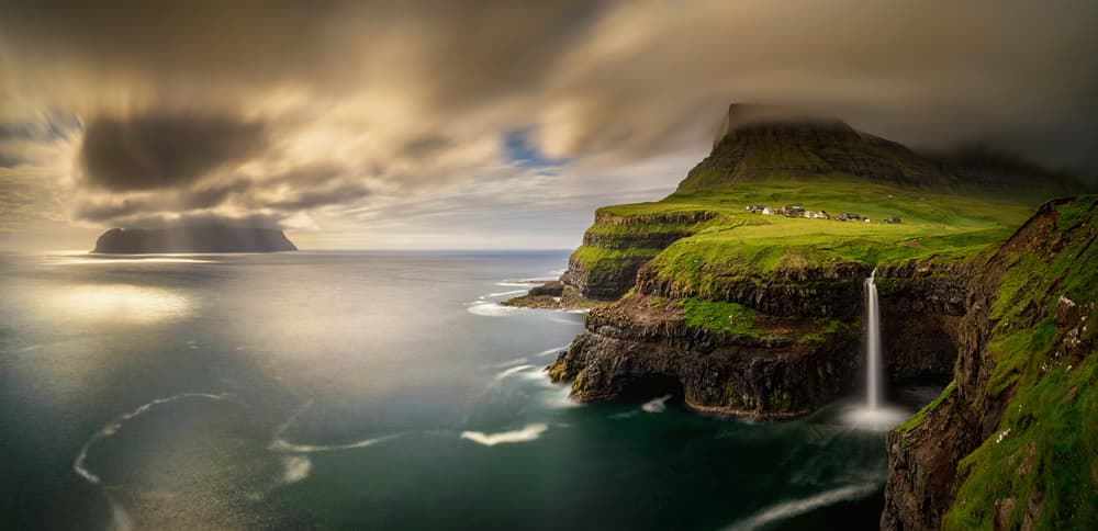 Green Cliffs Waterfall by Wojciech Kruczynski — canvas wall art