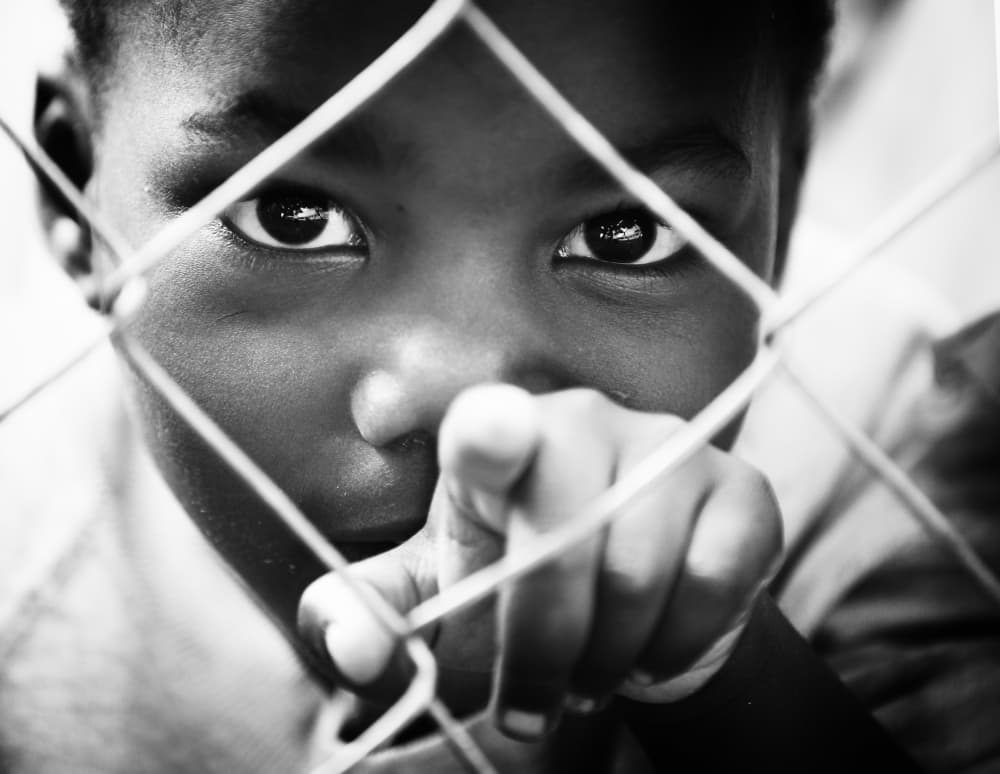 Boy's Intense Gaze by Goran Jovic — canvas wall art