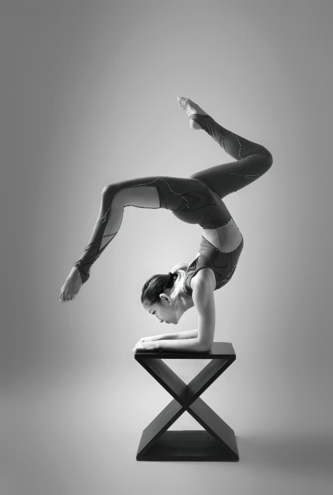 Acrobatic Balance Pose by Catherine Wang — canvas wall art