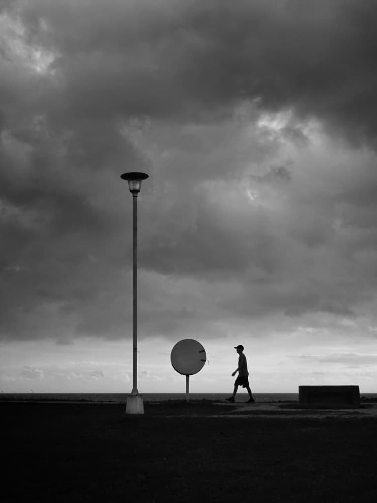 Man Under Dark Sky by Yi-Tang Wang — canvas wall art