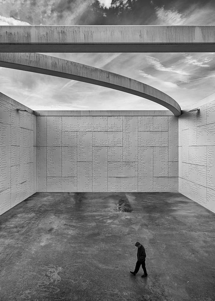 Solitary Figure Concrete Sky by Carlos Costa — canvas wall art