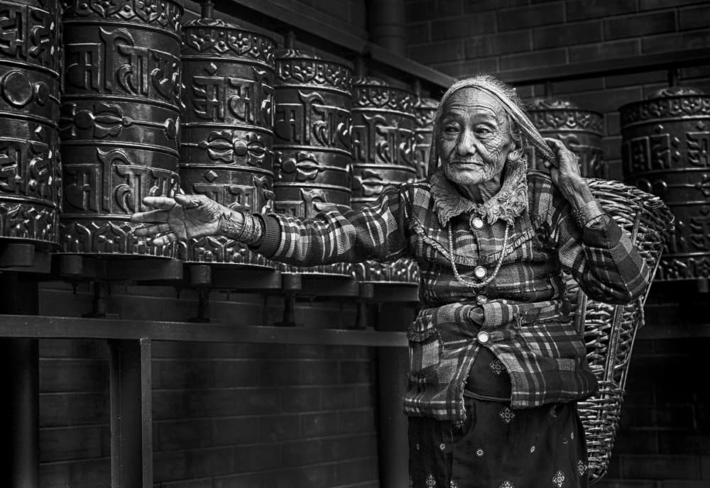 Elderly Woman's Devotion by Angela Muliani Hartojo — canvas wall art