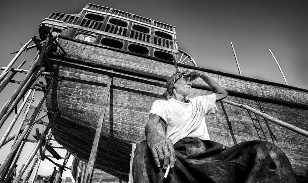 Gazing Shipyard Worker by Marjan Taghipour — canvas wall art