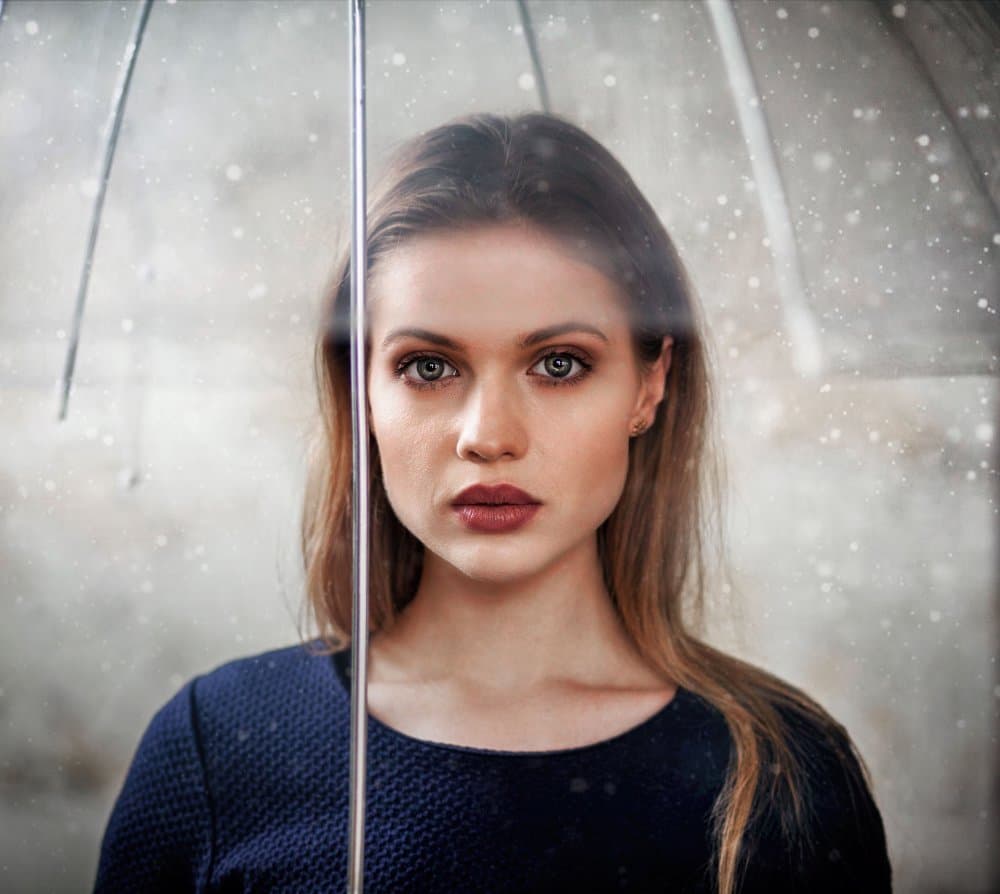 Winter Woman With Umbrella by Sandra Ulfig ARPS — canvas wall art