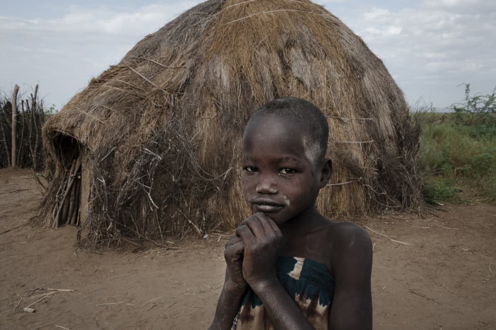 African Village Child by Elena Molina — canvas wall art