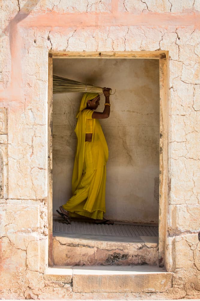Indian Woman with Broom by Amnon Eichelberg — canvas wall art