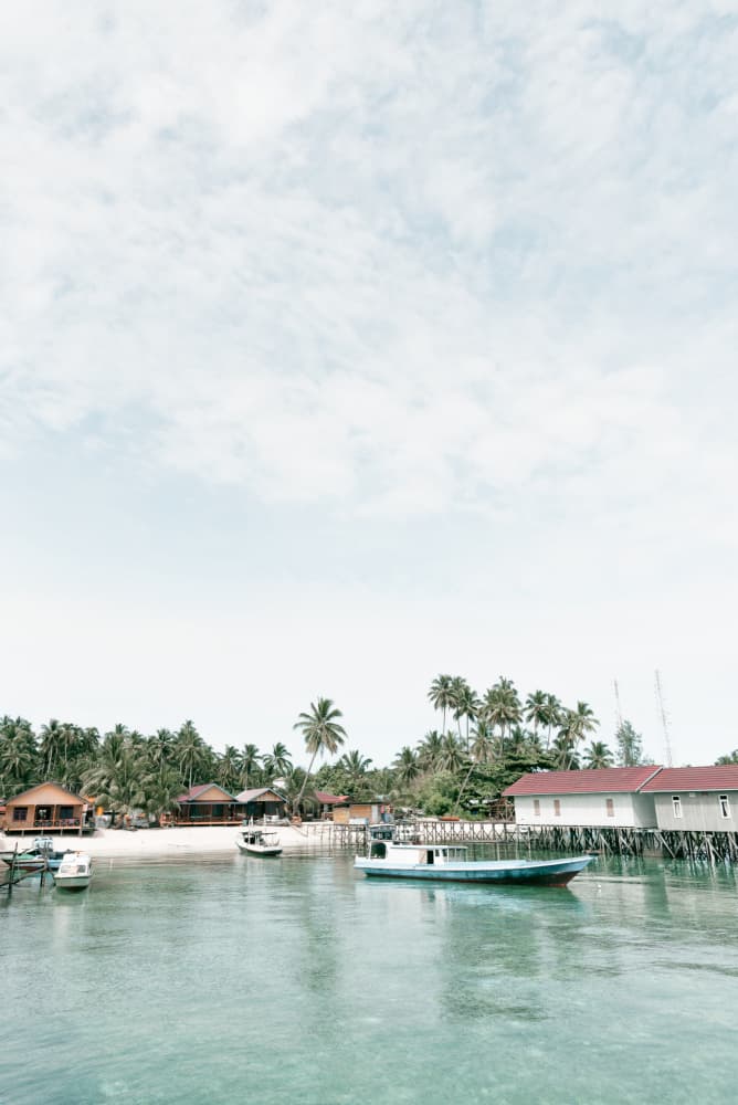 Tropical Island Village Boats by Photolovers — canvas wall art