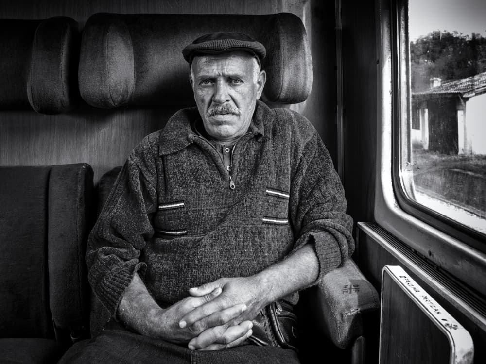 Pensive Train Passenger by djaniru — canvas wall art