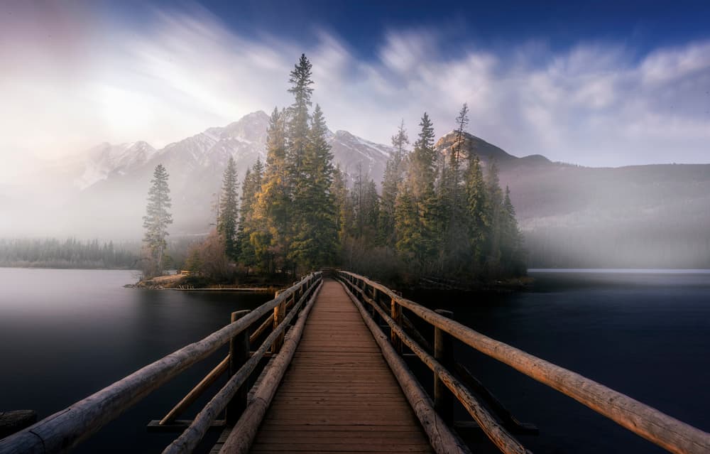 Misty Mountain Lake Bridge by Jorge Ruiz Dueso — canvas wall art
