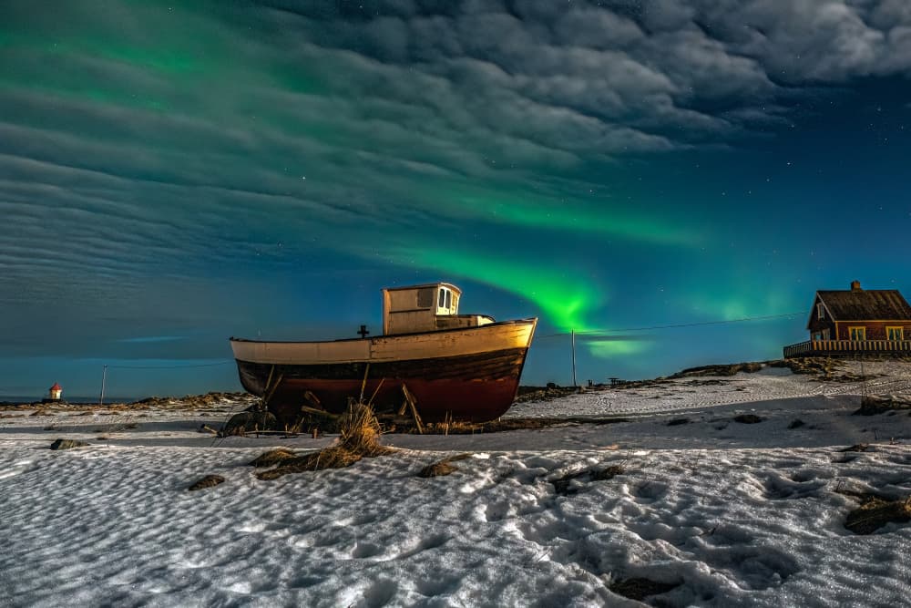 Northern Lights Winter Boat by Henk Goossens — canvas wall art