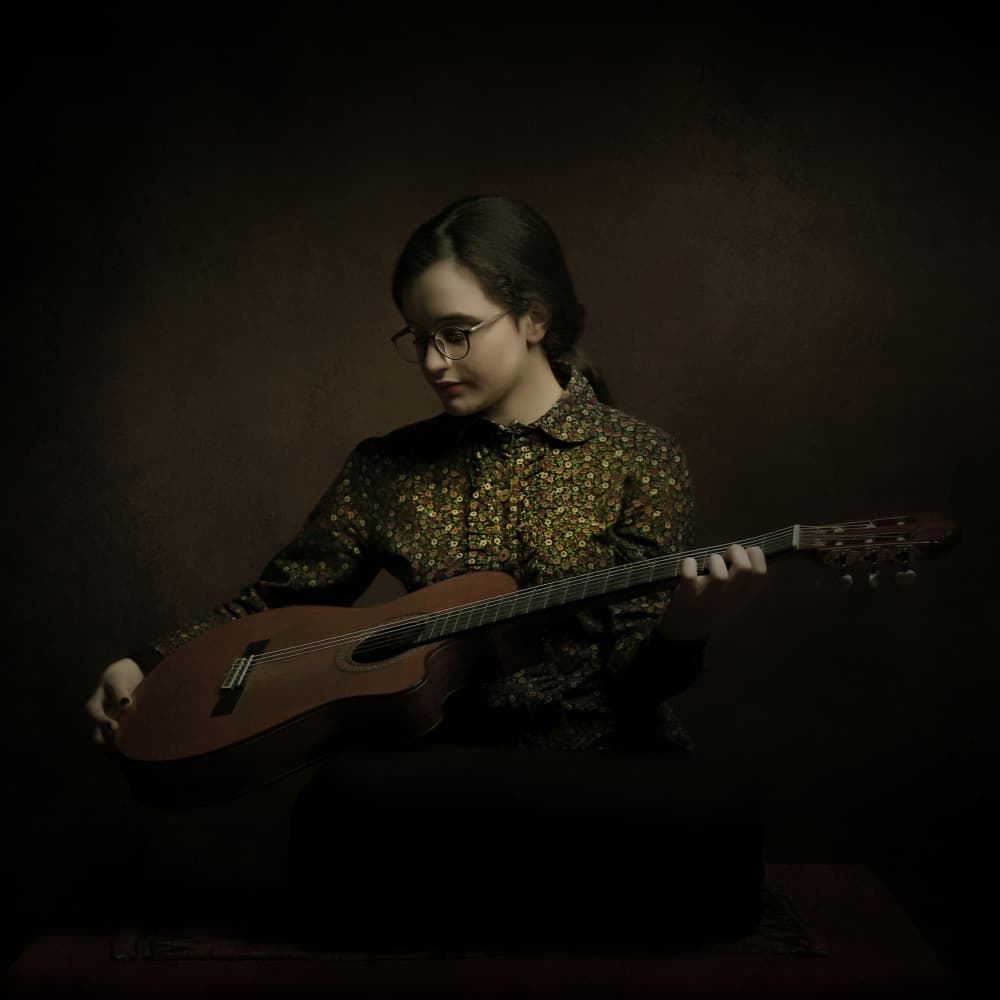 Pensive Guitarist by Moein Hasheminasab — canvas wall art