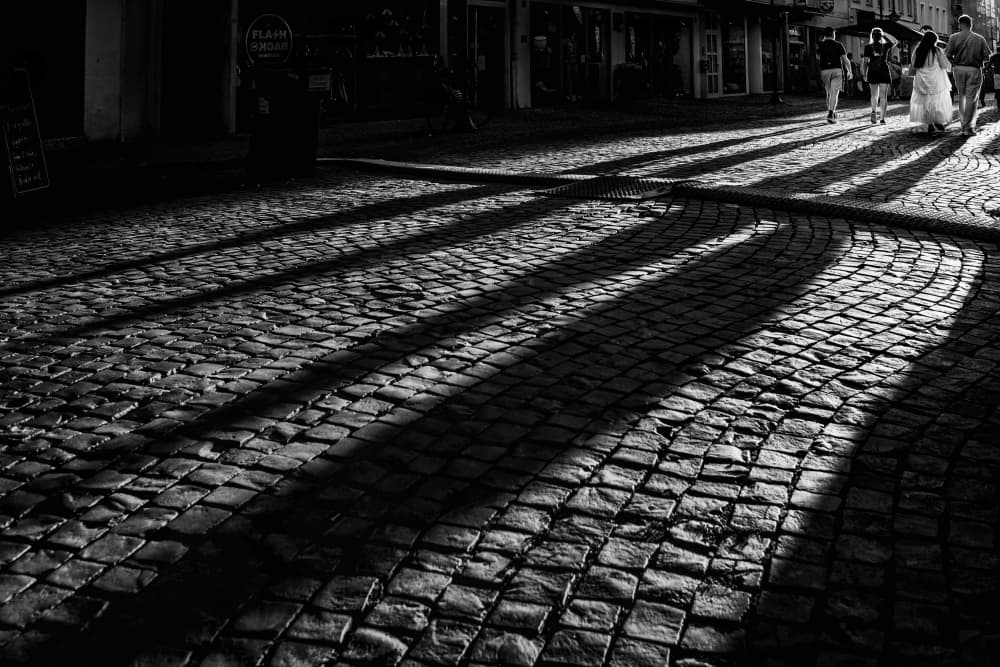 Shadows on Cobblestone Street by Eiji Yamamoto — canvas wall art