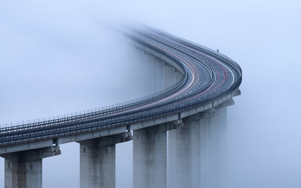 Misty Highway Curve by Riccardo Lucidi — canvas wall art