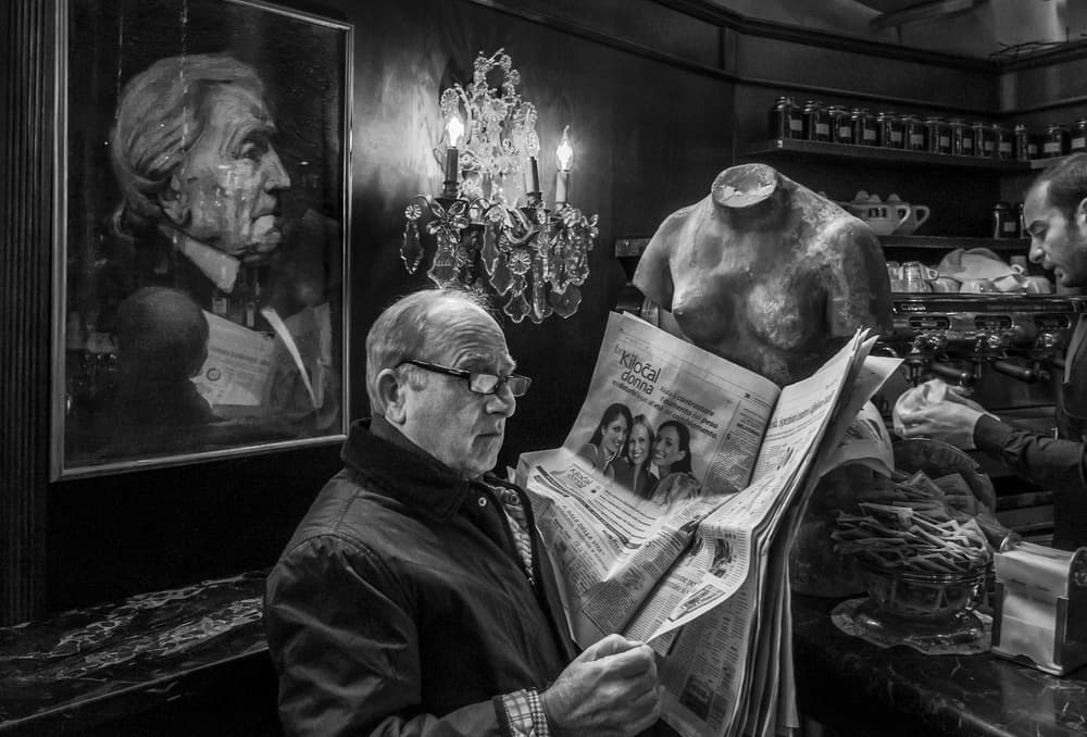 Vintage Cafe Reading by Giuseppe Grimaldi — canvas wall art
