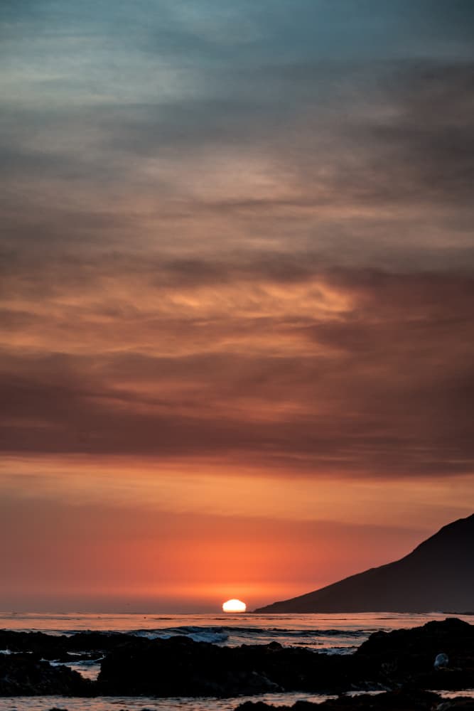 Dramatic Ocean Sunset by Tim Mossholder — canvas wall art