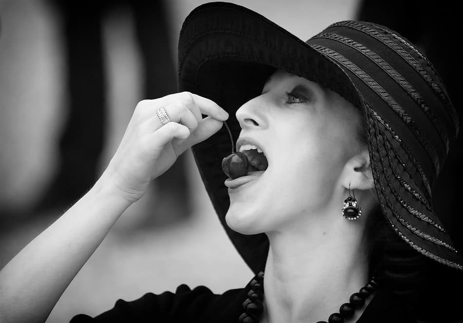 Elegant Woman Eating Cherries by Stefan Nielsen — canvas wall art