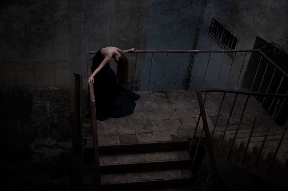 Melancholy Woman Dark Stairs by Joey Bangun — canvas wall art
