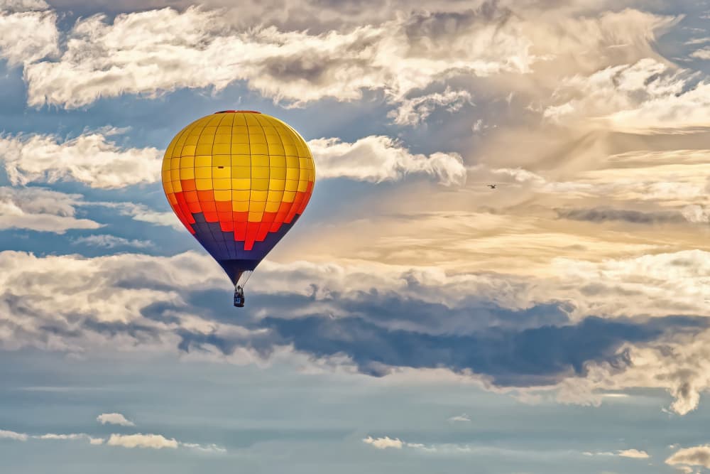 Colorful Hot Air Balloon by Lucie Gagnon — canvas wall art