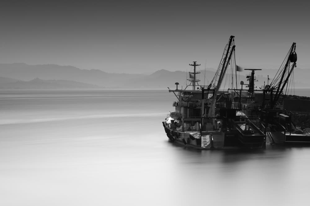 Long Exposure Fishing Boats by Mehmet inal — canvas wall art
