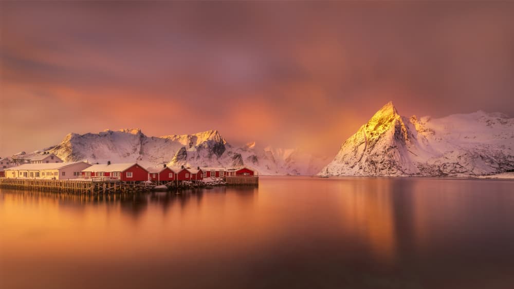 Red Cabins Winter Glow by Baldea Victor-Emilian — canvas wall art