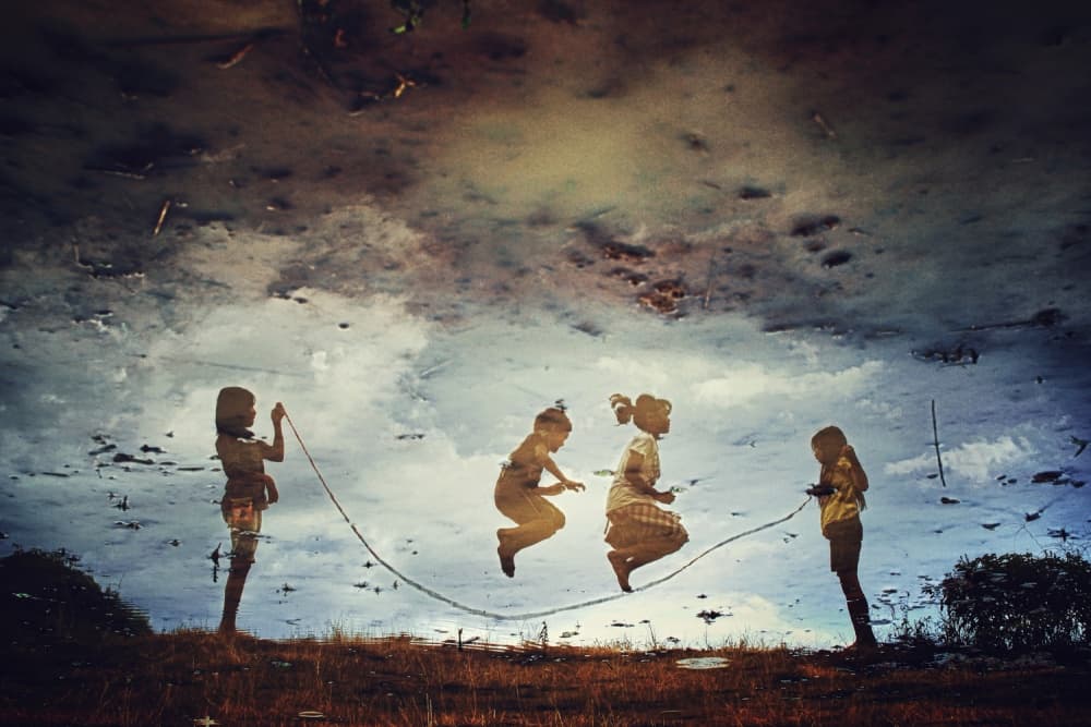 Kids Jumping in Sky by Jay Satriani — canvas wall art