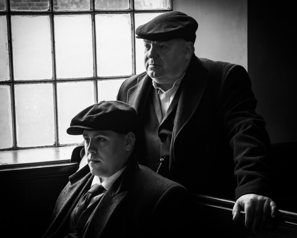 Contemplative Urban Men by Richard Bland — canvas wall art