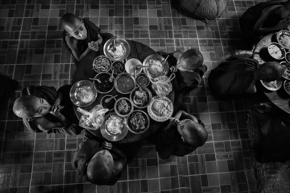 Monks Sharing a Meal by Gunarto Song — canvas wall art