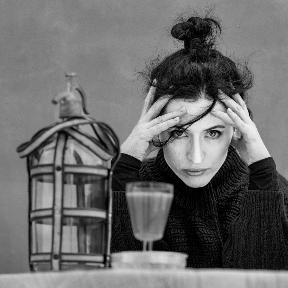 Pensive Woman Black White by Silvija Danelsone — canvas wall art