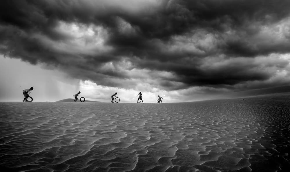 Kids Playing Desert Storm by Nguyen Tan Tuan — canvas wall art