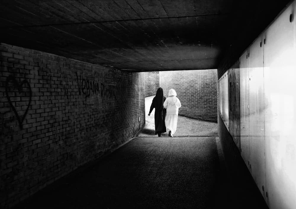 Women Walking Tunnel Light by Luciano Caturegli — canvas wall art
