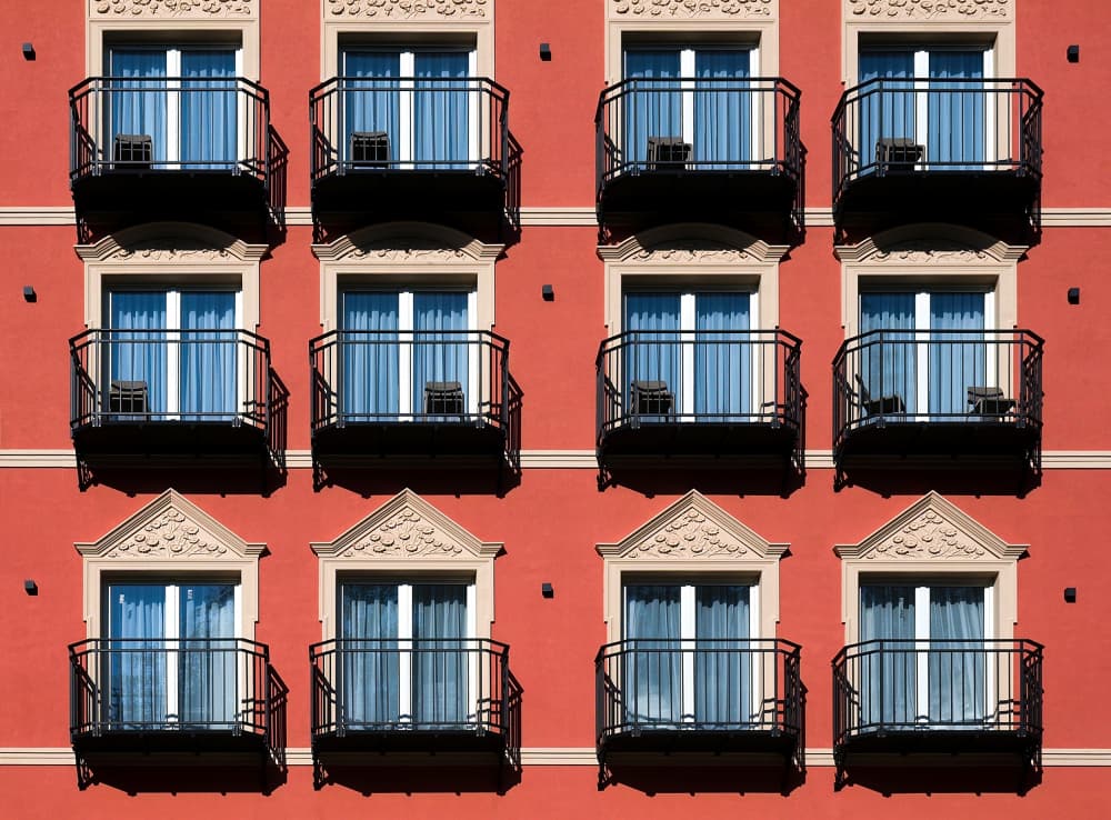 Sunny Red Balconies by Milan Uhrin  AFIAP AZSF — canvas wall art