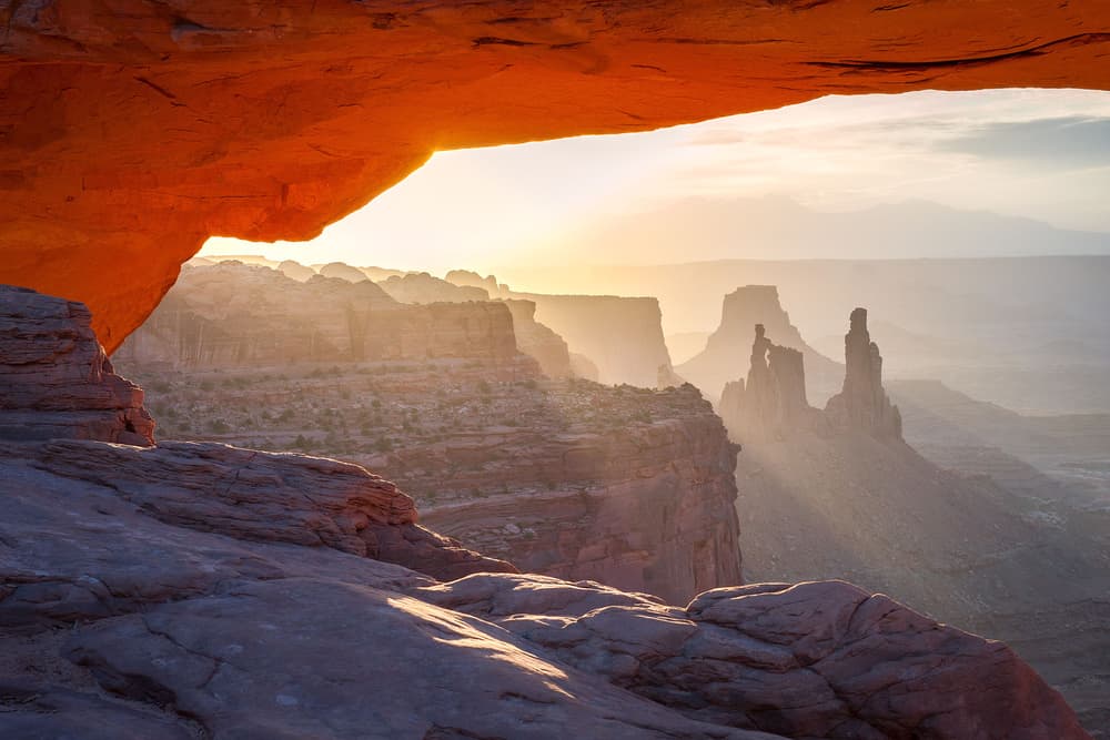 Sunrise Through Stone Arch by Nick Kalathas — canvas wall art