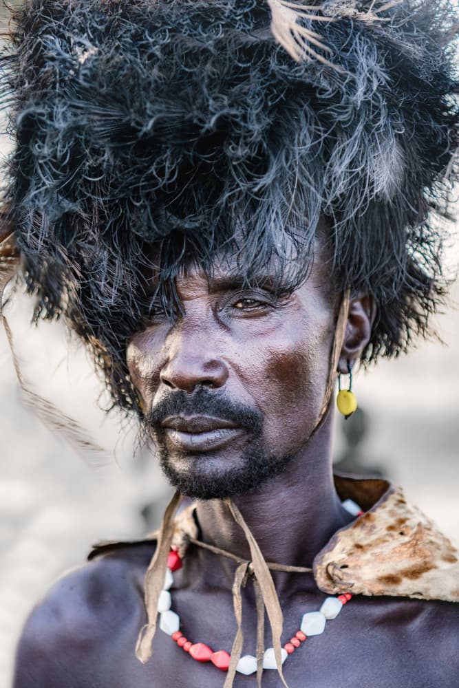 Tribal Man with Feathers by Trevor Cole — canvas wall art