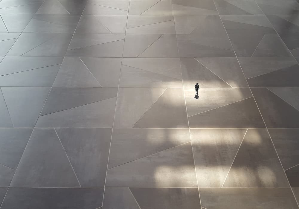 Lone Figure Geometric Floor by Huib Limberg — canvas wall art