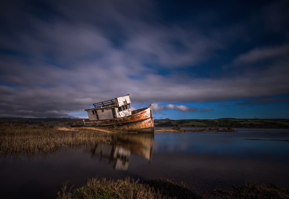 Abandoned Boat Reflection by Jenny Qiu — canvas wall art