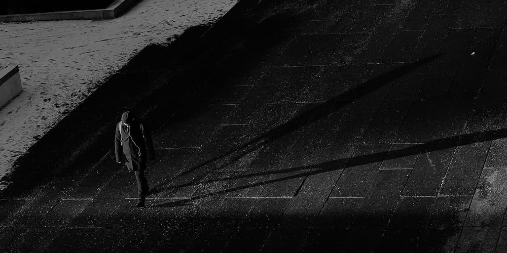 Solitary Urban Walk by Jian Wang — canvas wall art