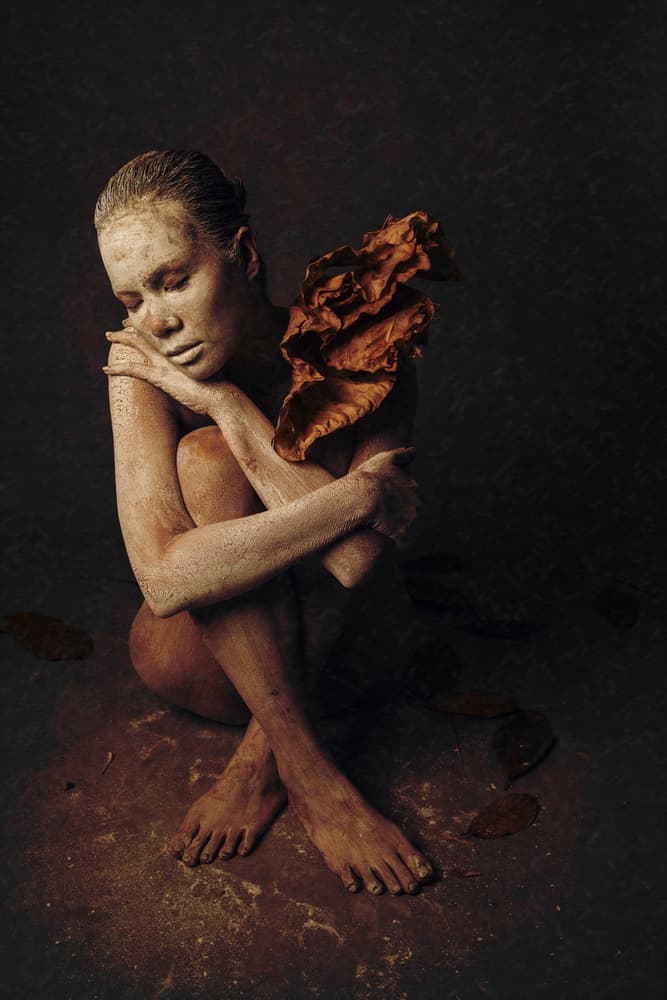Contemplative Earth Woman by Itthipol Deemee — canvas wall art