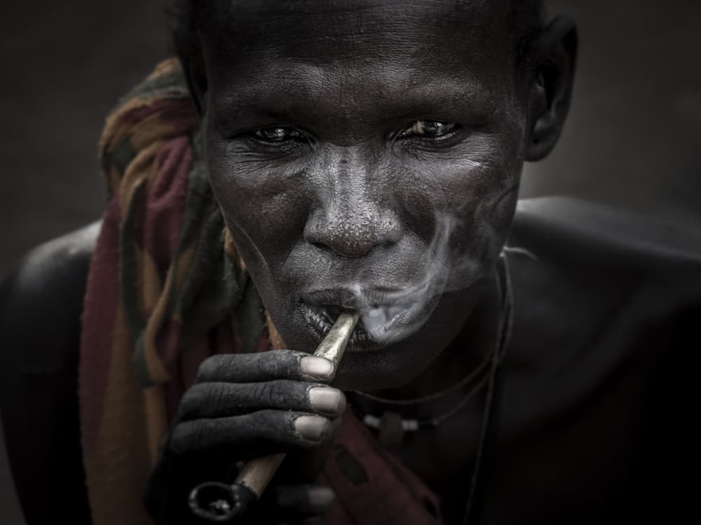 Intense Woman Smoking Pipe by Elena Molina — canvas wall art