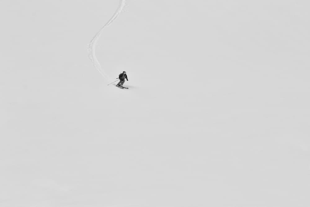 Solitary Skier Mountain Snow by Anita Palceska — canvas wall art