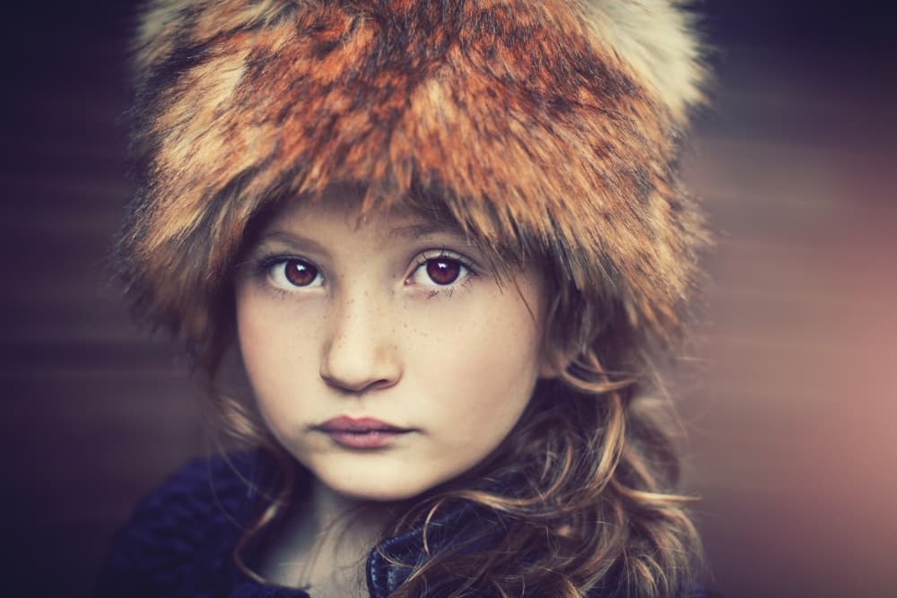 Young Girl Fur Hat by Elena Karagyozova — canvas wall art