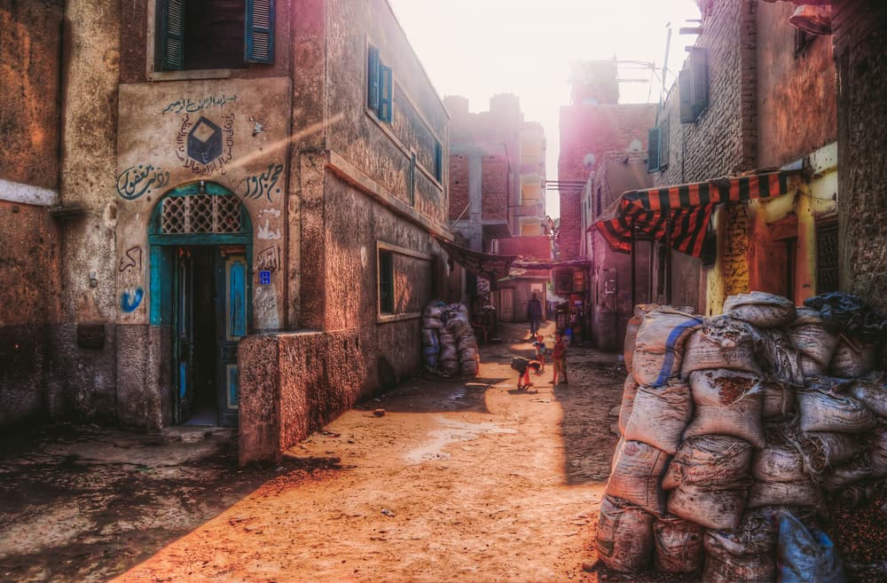 Sunlit Old Town Alley by Mohamed Kazzaz — canvas wall art