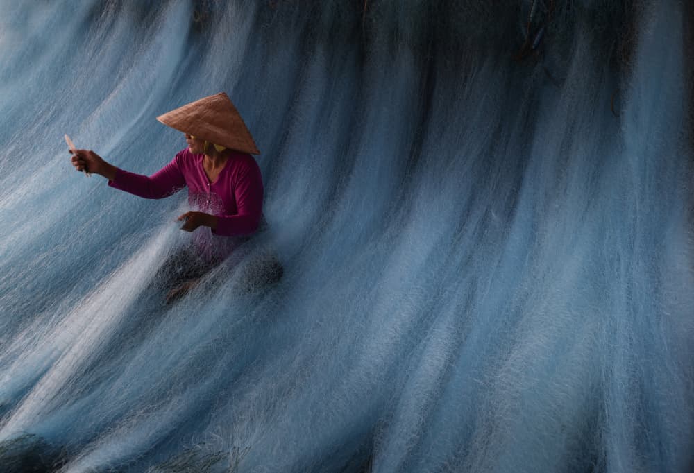 Woman Mending Fishing Nets by Clas Gustafson PRO — canvas wall art